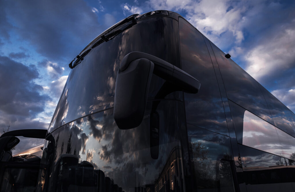 The windshield of a charter bus